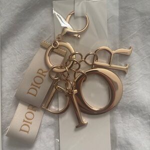 Dior Gold and Cream Key Holder with Logo Charms